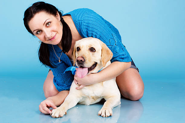 istock happy girl hugging with her dog 480132833