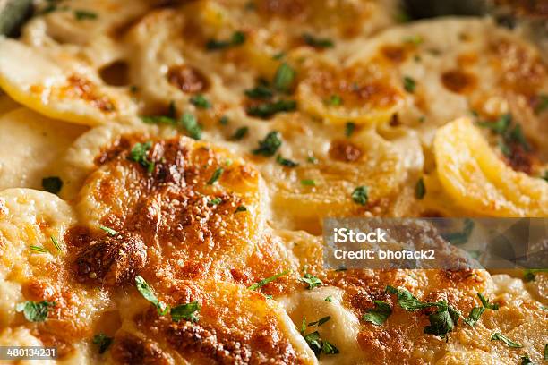 Homemade Cheesey Scalloped Potatoes Stock Photo - Download Image Now - Baked, Baked Potato, Casserole