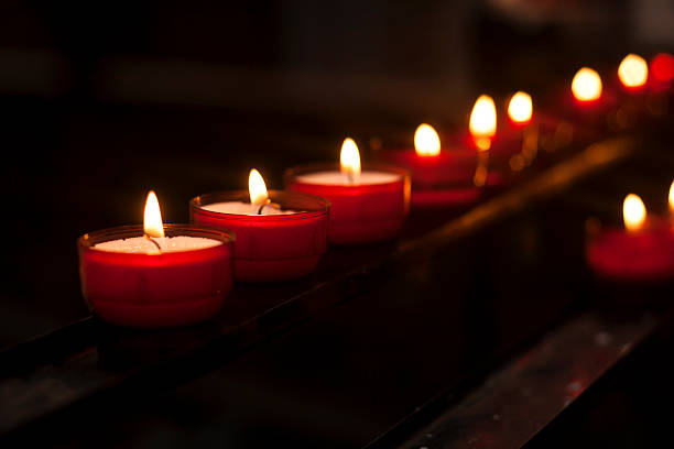 istock red candles in the darkness 480135830