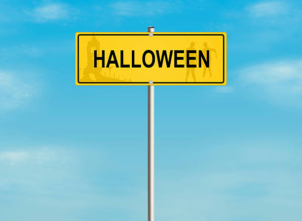 istock Halloween road sign on the sky background. 480137640