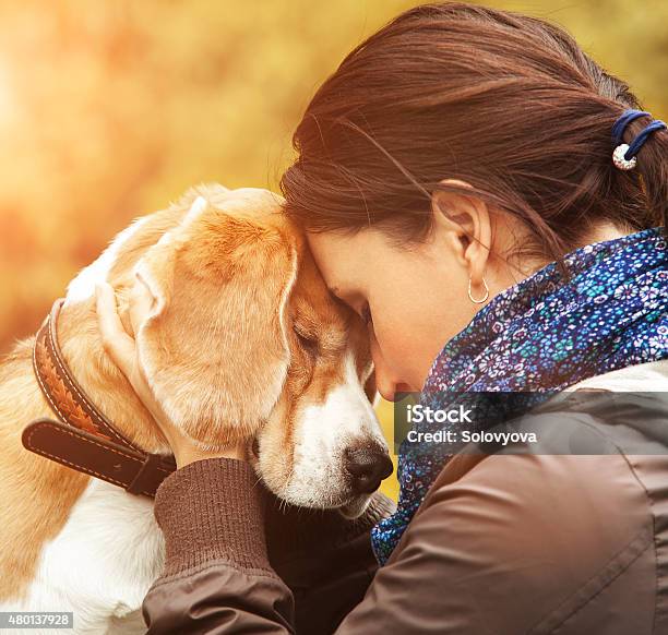 Woman With Her Dog Tender Scene Stock Photo - Download Image Now - Dog, Affectionate, Embracing