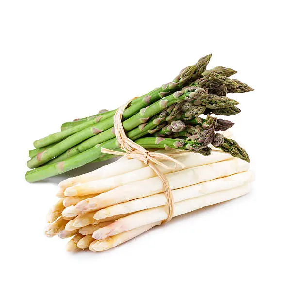 Green and white asparagus isolated on white background