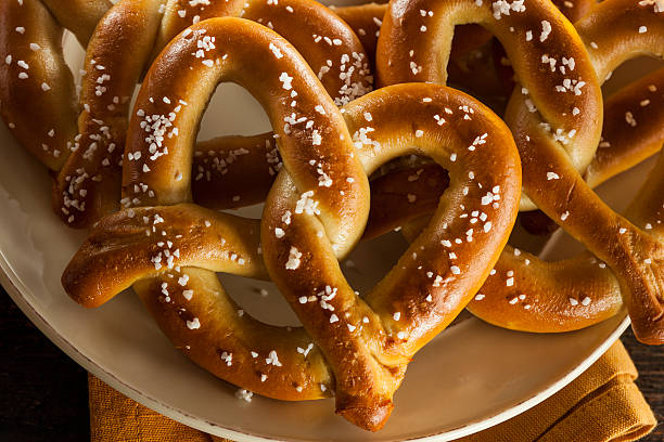 Homemade Soft Pretzels with Salt Homemade Soft Pretzels with Salt Ready to Eat softness stock pictures, royalty-free photos & images