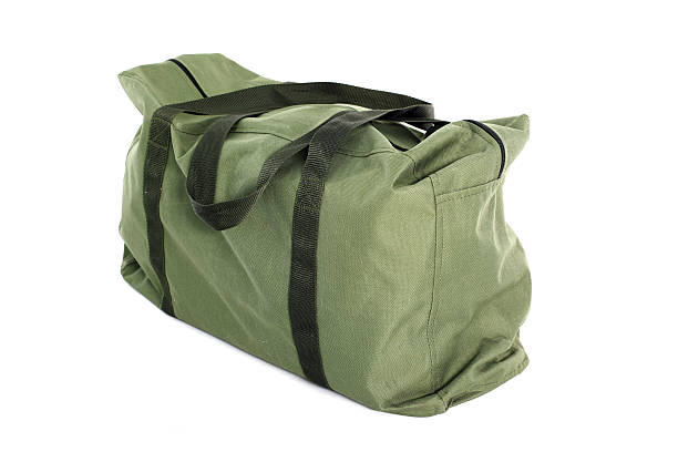 istock Green bag isolated over white background 480138725