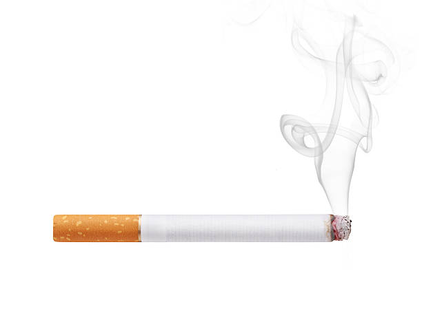 Smoking cigarette Smoking cigarette isolated on white background cigarette photos stock pictures, royalty-free photos & images