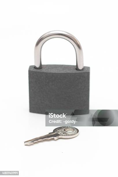 Padlock Key On The Table Stock Photo - Download Image Now - Cut Out, Focus On Foreground, Front View