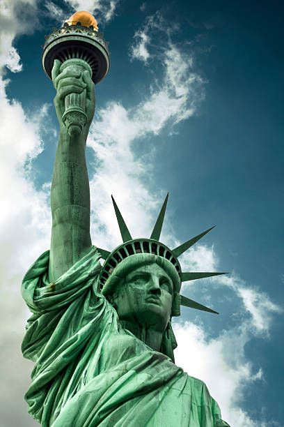 istock Statue of Liberty on a cloudy day 480141890