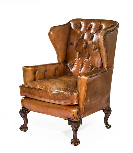 istock antique leather wing chair carved legs isolated 480142162