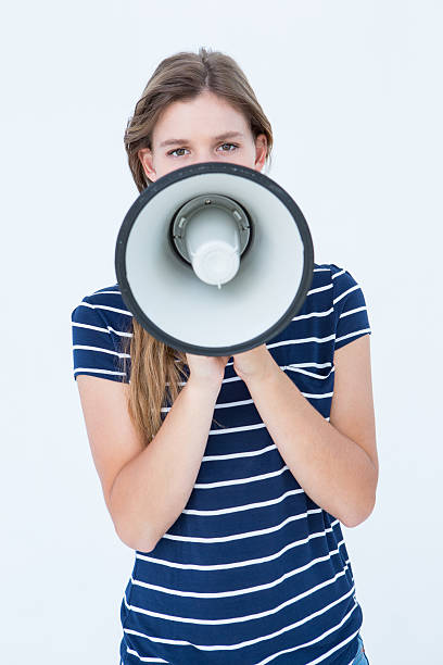 istock Woman speaking through a loudspeaker 480142724