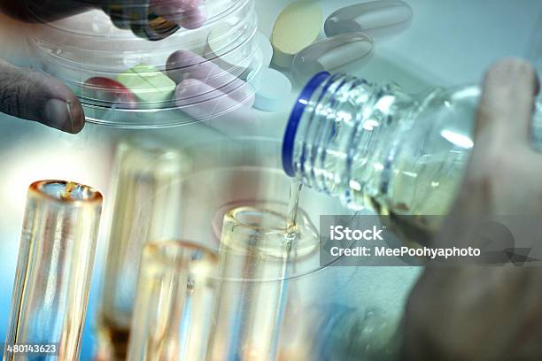 Adding Agar Fluid From Bottle To Test Tubes Stock Photo - Download Image Now - Agar Jelly, Analyzing, Baby Bottle