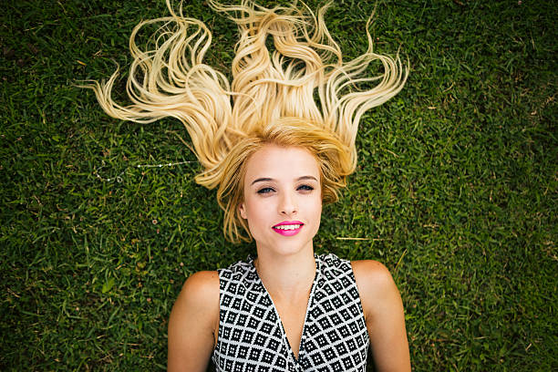 istock Young blonde woman summer day relaxing 480144720