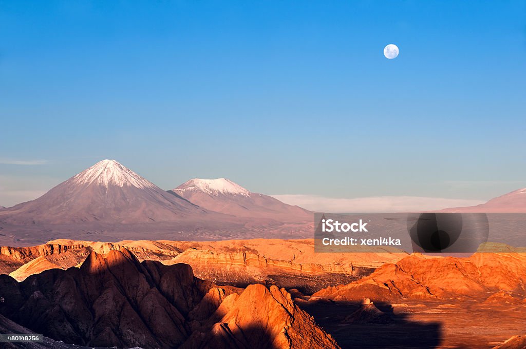 Moon Valley, Atacama, Chile Volcanoes Licancabur and Juriques, Moon Valley, Atacama, Chile Atacama Desert Stock Photo