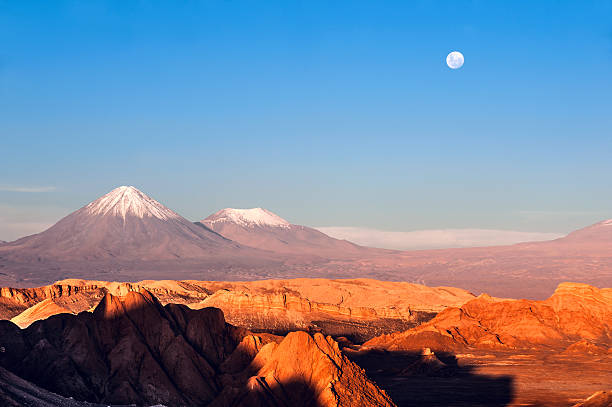 Moon Valley, Atacama, Chile Volcanoes Licancabur and Juriques, Moon Valley, Atacama, Chile atacama desert photos stock pictures, royalty-free photos & images