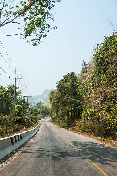 istock road in thailand countryside forest 480150362