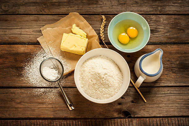 istock Dough recipe ingredients on vintage rural wood kitchen table 480153731