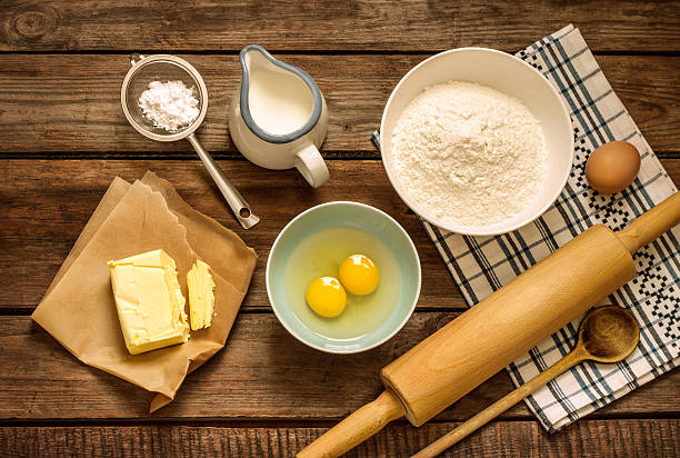 istock Dough recipe ingredients on vintage rural wood kitchen table 480153743