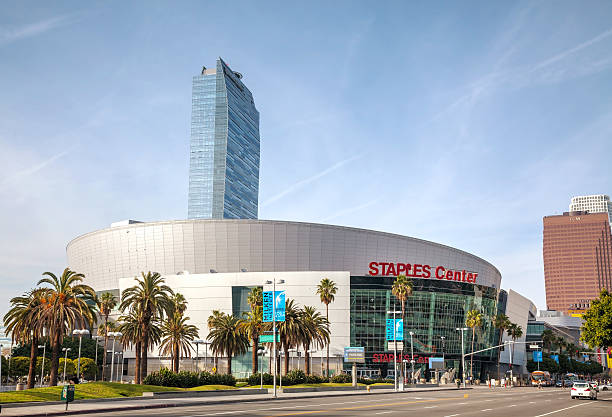Staples Center in downtown Los Angeles, CA Los Angeles, USA - April 22, 2014: Staples Center building with people in Los Angeles, California. Staples Center is a large multi-purpose sports arena in Downtown Los Angeles. los angeles kings stock pictures, royalty-free photos & images