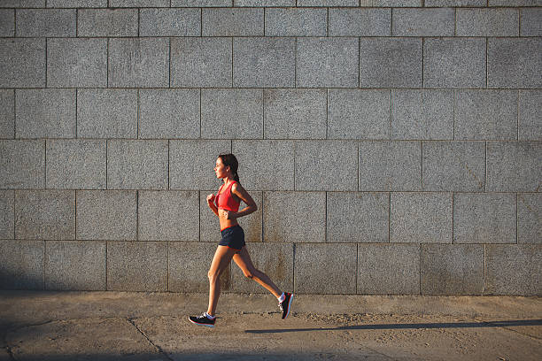 istock woman working out in an urban setting 480155150