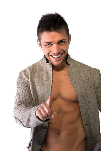 istock Smiling muscular young man pointing finger to camera 480160997