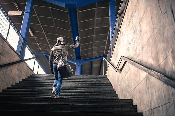 istock Rear view of a man waving to someone from subway. 480161506