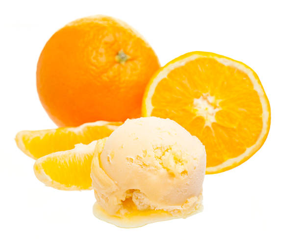 istock orange ice cream scoop in front of whole orange 480161698