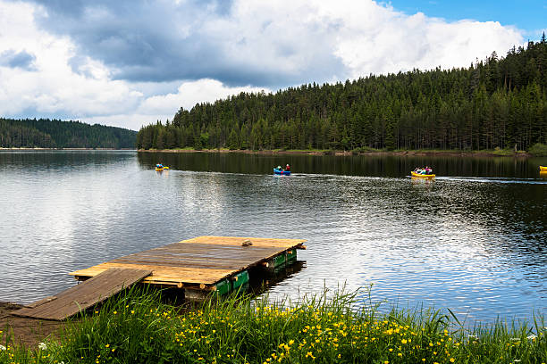 istock Canoes in a mountain lake. 480164904