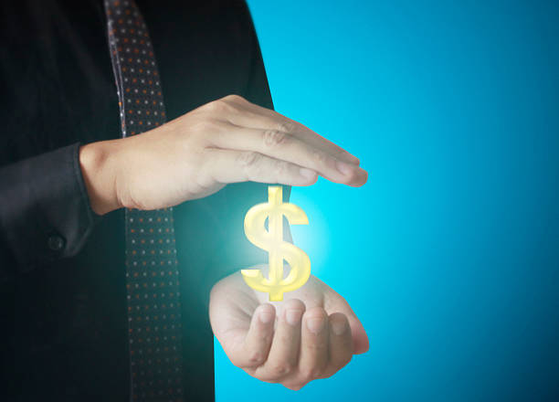istock Man touching online button with money icon 480169666