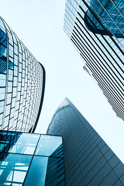 istock Modern glass architecture on three office buildings with steel construction 480169670