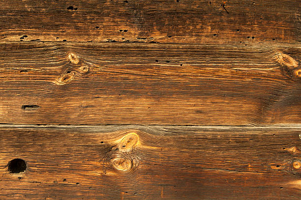 istock Wall of the old boards with a hole 480170135