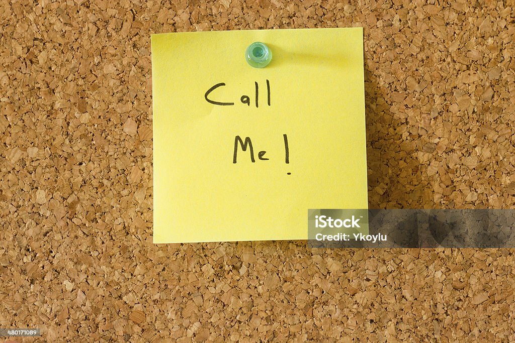 Call Me Note Call Me adhesive note on cork board Adhesive Note Stock Photo