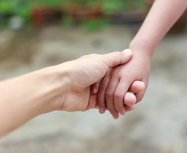 istock Mother hand and child 480173784