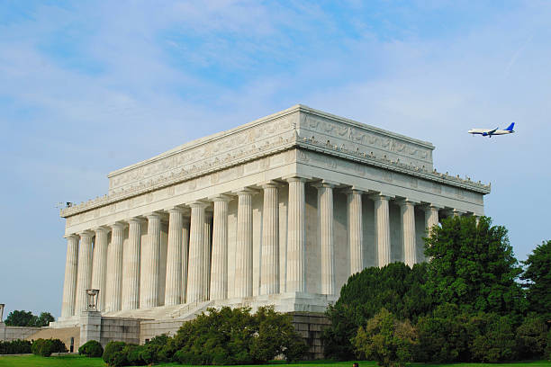 istock Airplane Flying over Lincoln Monument Washington DC 480174766