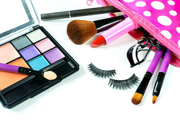 istock make up bag with cosmetics and brushes isolated 480174908