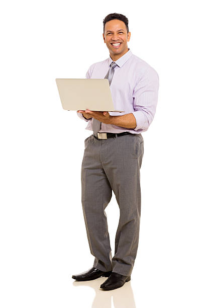 istock middle aged corporate worker holding laptop 480174924