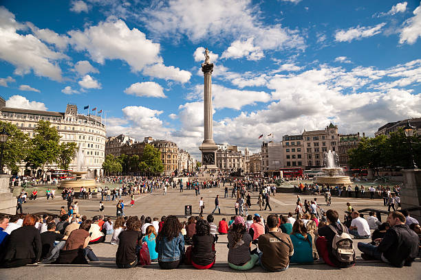 Nelson's Column in Trafalgar Square London, United Kingdom - July 20, 2008 : Tourists are watching Nelson's Column in Trafalgar Square, London. admiral nelson stock pictures, royalty-free photos & images