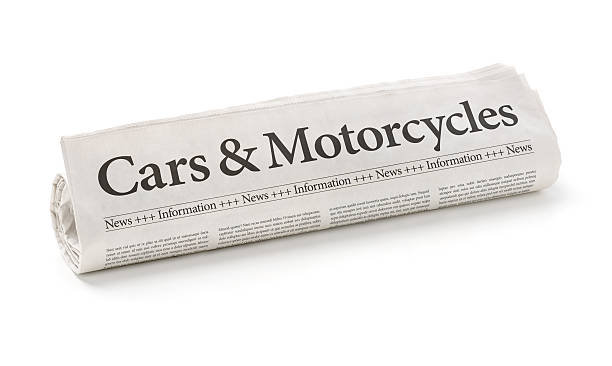 istock Rolled newspaper with the headline Cars and Motorcycles 480182730