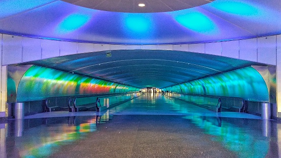 The underground walkway connecting concources A to B and C has dancing LED lights behind etched glass panels. The lights change colors and are set to music as you walk through. There are moving walkways to help speed up walkers connecting to their gates in opposite concourses. Detroit Metro Wayne County Airport McNamara Terminal.