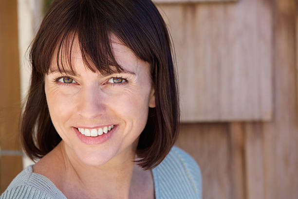 istock Beautiful older woman smiling 480183900
