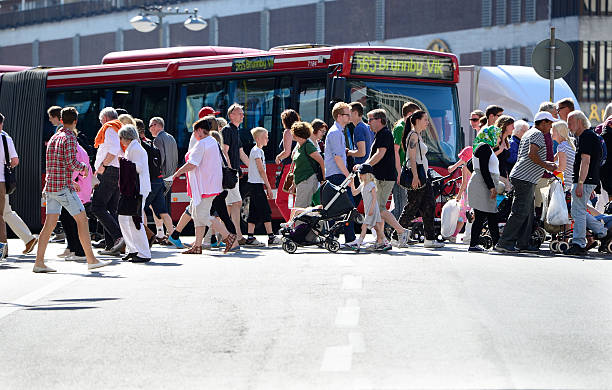 istock Pedestrians crossing street, traffic in background 480186558