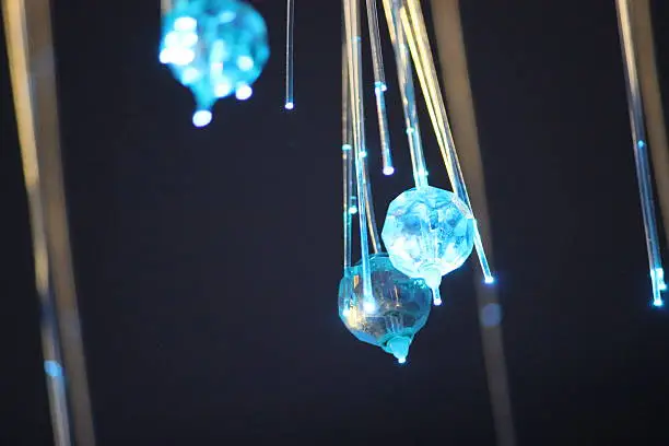 This image shows LED lights, in an abstract form, with crystal balls for reflection. The other images in the series show brown and dark blue illumination of similar setup.