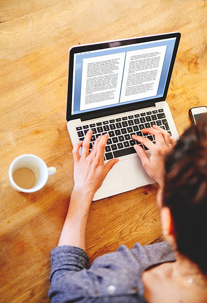 istock Female novelist writing on the laptop 480187740