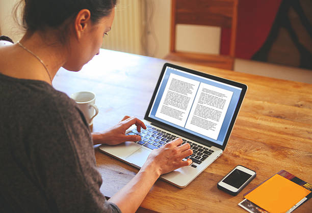 istock Female novelist writing on the laptop 480187782