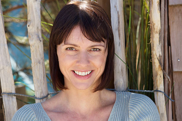 istock Fresh face older woman smiling 480187794