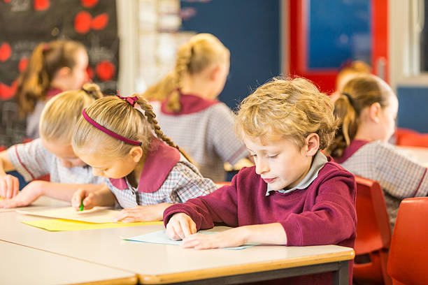 istock School children working in the classroom 480187810