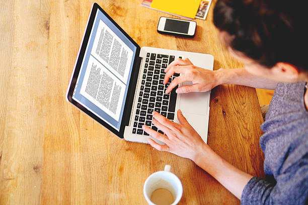 istock Female novelist writing on the laptop 480187854