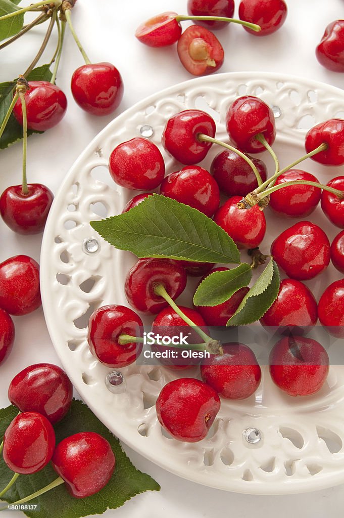 Fresh red cherry Fresh red cherry on the white background Agriculture Stock Photo