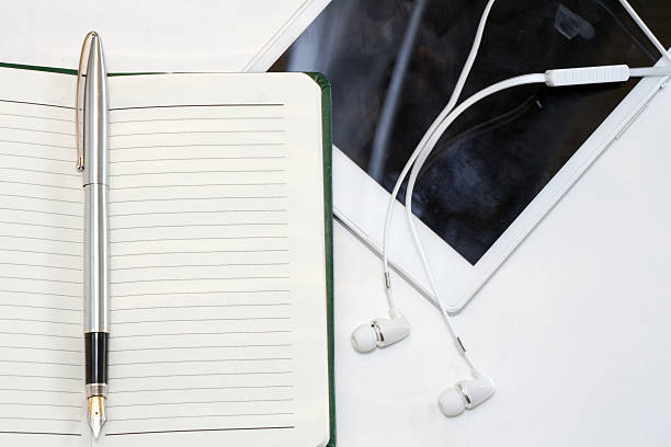 istock Pen and headphones 480190998