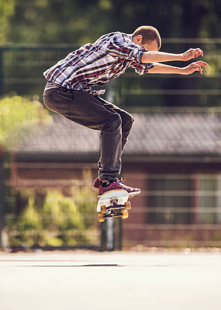 istock Skateboarder exercising Ollie skateboarding at the park. 480191104