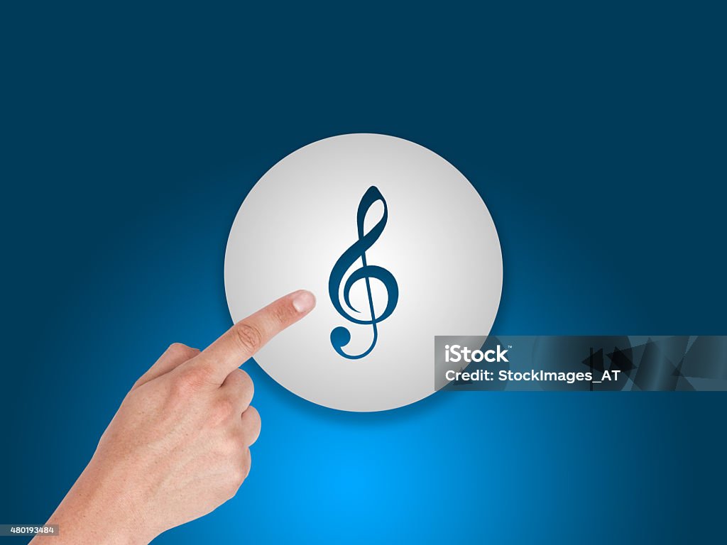 Digital Music Button Indexfinger touches a digital music button. Self created. 2015 Stock Photo