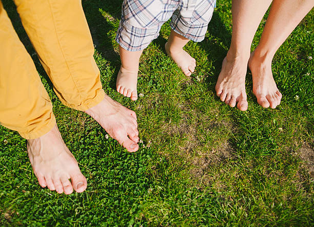 40+ Barefoot Couple Human Foot Grass Stock Photos, Pictures & Royalty ...